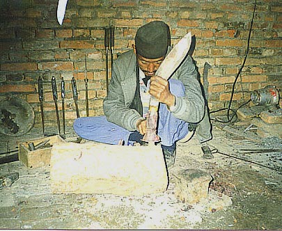 Kesar making a khukuri handle